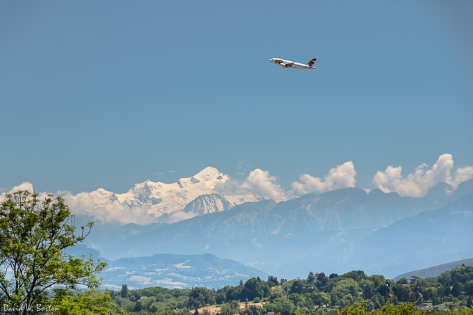 Airliner taking departing Geneva Airport with Mont-Blanc in the background